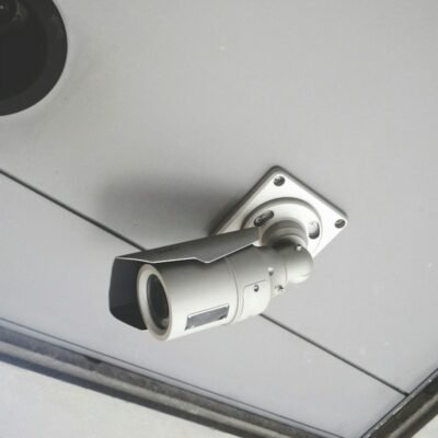 Security camera mounted to a ceiling
